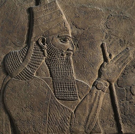 Tiglath-Pileser III, King of Assyria( 745–727 BC), demonstrates a measuring staff